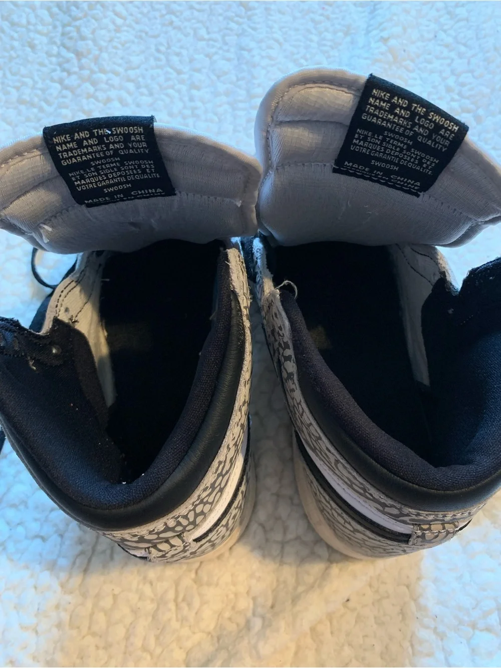 Nike Kids High-Top Sneakers in White, Black, and Gray Elephant Print